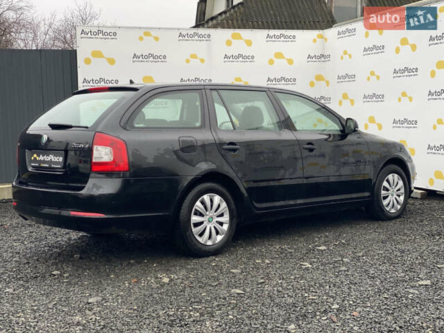 Черный Шкода Октавия, объемом двигателя 1.6 л и пробегом 258 тыс. км за 8500 $, фото 6 на Automoto.ua