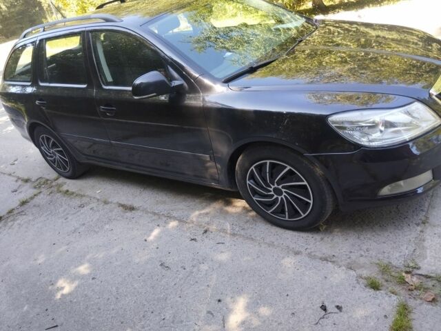Черный Шкода Октавия, объемом двигателя 1 л и пробегом 240 тыс. км за 7999 $, фото 2 на Automoto.ua