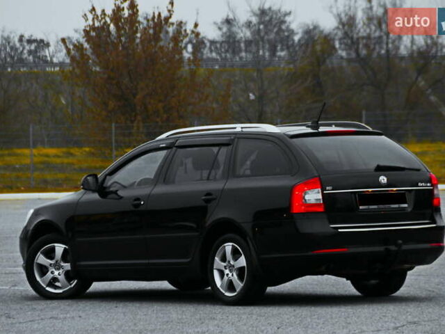 Черный Шкода Октавия, объемом двигателя 1.6 л и пробегом 132 тыс. км за 8450 $, фото 1 на Automoto.ua