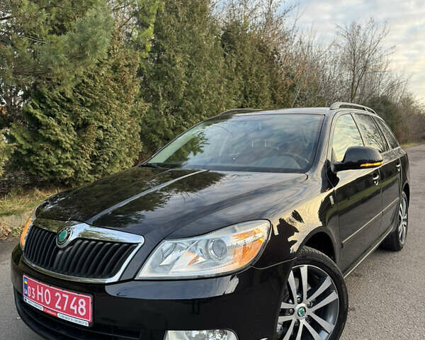 Черный Шкода Октавия, объемом двигателя 2 л и пробегом 217 тыс. км за 10550 $, фото 2 на Automoto.ua
