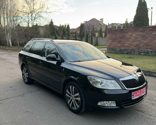 Черный Шкода Октавия, объемом двигателя 2 л и пробегом 217 тыс. км за 10550 $, фото 4 на Automoto.ua
