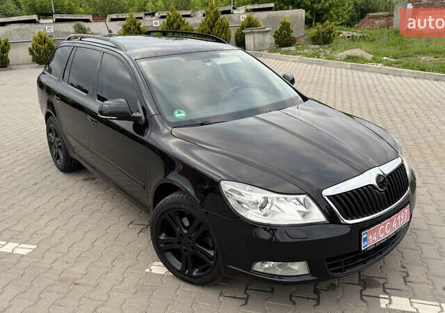 Чорний Шкода Октавія, об'ємом двигуна 2 л та пробігом 310 тис. км за 10600 $, фото 10 на Automoto.ua