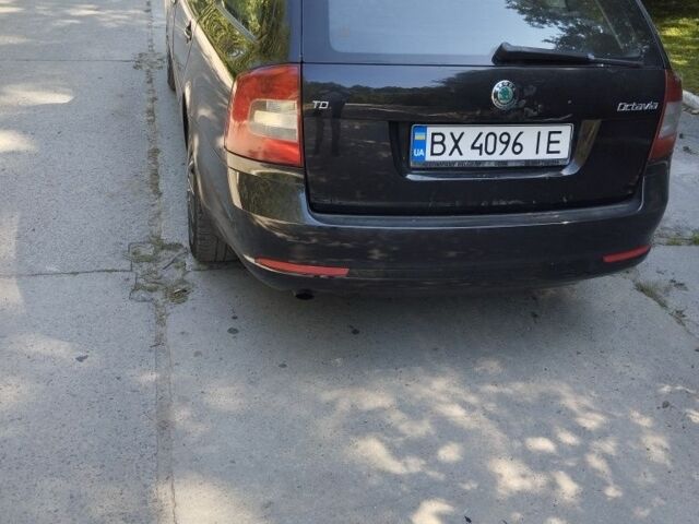 Черный Шкода Октавия, объемом двигателя 1 л и пробегом 240 тыс. км за 7999 $, фото 3 на Automoto.ua
