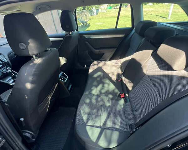 Черный Шкода Октавия, объемом двигателя 1.6 л и пробегом 299 тыс. км за 9999 $, фото 7 на Automoto.ua