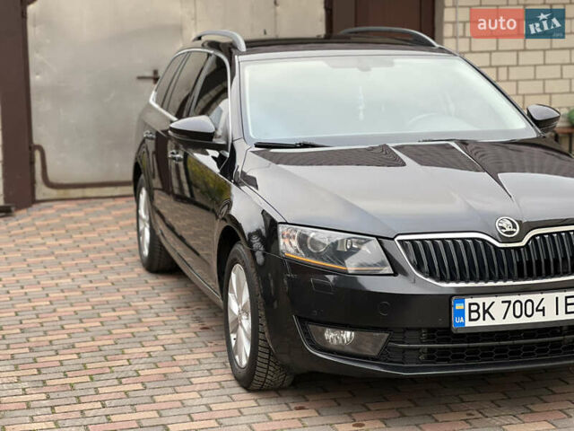 Черный Шкода Октавия, объемом двигателя 2 л и пробегом 312 тыс. км за 13500 $, фото 2 на Automoto.ua