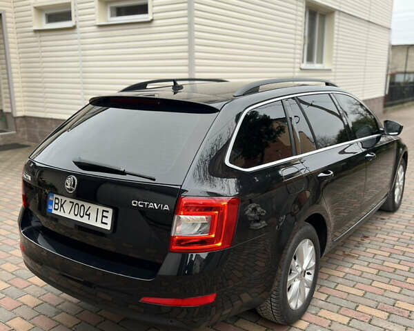 Черный Шкода Октавия, объемом двигателя 2 л и пробегом 312 тыс. км за 13500 $, фото 11 на Automoto.ua