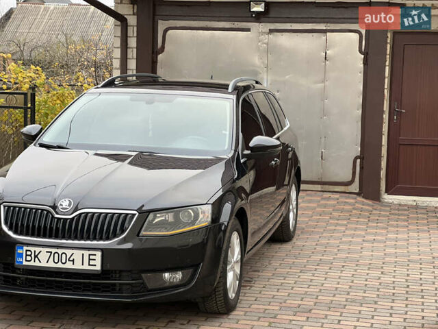 Черный Шкода Октавия, объемом двигателя 2 л и пробегом 312 тыс. км за 13500 $, фото 1 на Automoto.ua