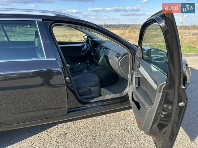 Черный Шкода Октавия, объемом двигателя 1.6 л и пробегом 209 тыс. км за 11500 $, фото 1 на Automoto.ua