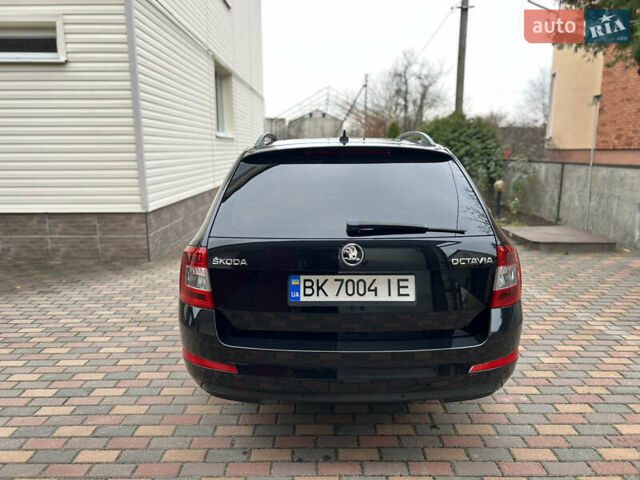 Черный Шкода Октавия, объемом двигателя 2 л и пробегом 312 тыс. км за 13500 $, фото 5 на Automoto.ua
