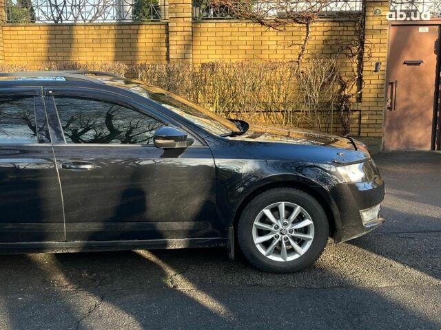 Черный Шкода Октавия, объемом двигателя 1.6 л и пробегом 227 тыс. км за 12790 $, фото 5 на Automoto.ua