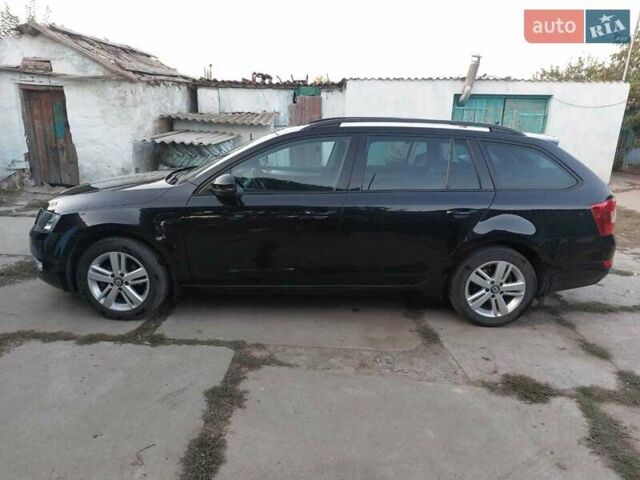 Черный Шкода Октавия, объемом двигателя 1.6 л и пробегом 245 тыс. км за 11000 $, фото 1 на Automoto.ua
