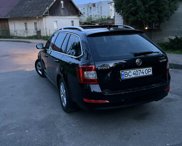 Чорний Шкода Октавія, об'ємом двигуна 1.6 л та пробігом 252 тис. км за 11599 $, фото 7 на Automoto.ua