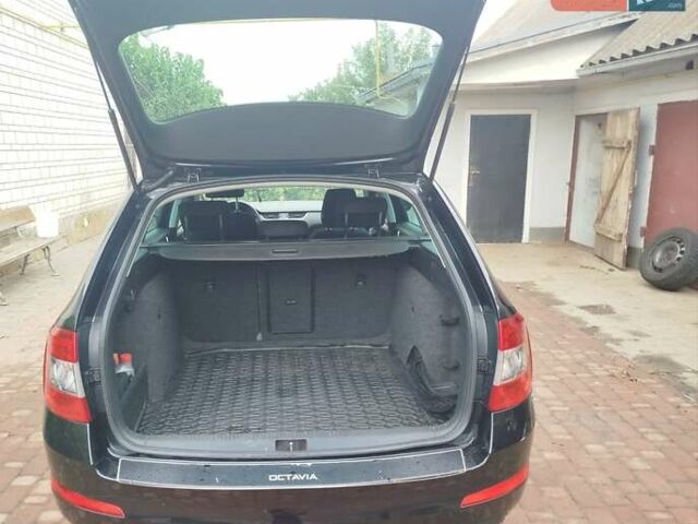 Черный Шкода Октавия, объемом двигателя 1.6 л и пробегом 307 тыс. км за 10499 $, фото 8 на Automoto.ua