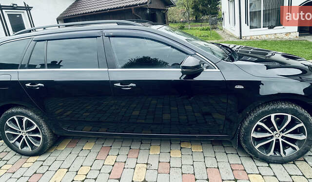 Чорний Шкода Октавія, об'ємом двигуна 2 л та пробігом 390 тис. км за 11000 $, фото 3 на Automoto.ua