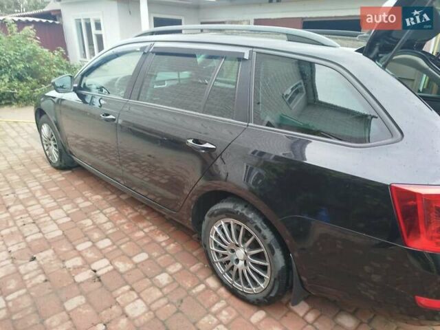 Черный Шкода Октавия, объемом двигателя 1.6 л и пробегом 307 тыс. км за 10499 $, фото 2 на Automoto.ua