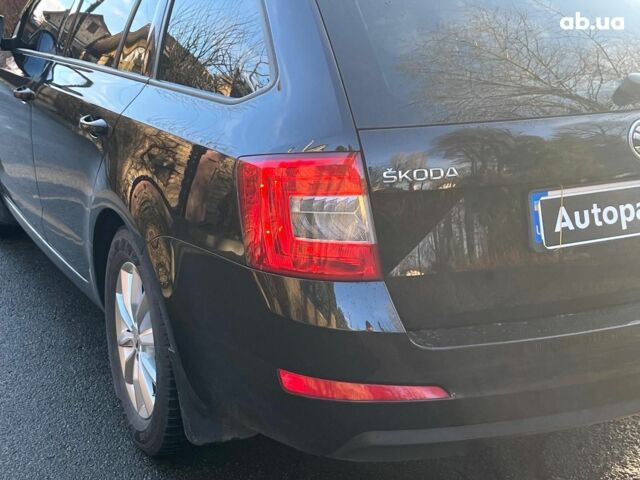 Черный Шкода Октавия, объемом двигателя 1.6 л и пробегом 227 тыс. км за 12790 $, фото 10 на Automoto.ua