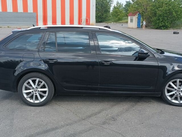 Чорний Шкода Октавія, об'ємом двигуна 2 л та пробігом 232 тис. км за 13500 $, фото 2 на Automoto.ua