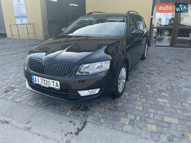 Черный Шкода Октавия, объемом двигателя 2 л и пробегом 293 тыс. км за 12500 $, фото 1 на Automoto.ua