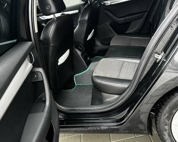 Чорний Шкода Октавія, об'ємом двигуна 1.6 л та пробігом 149 тис. км за 10999 $, фото 16 на Automoto.ua