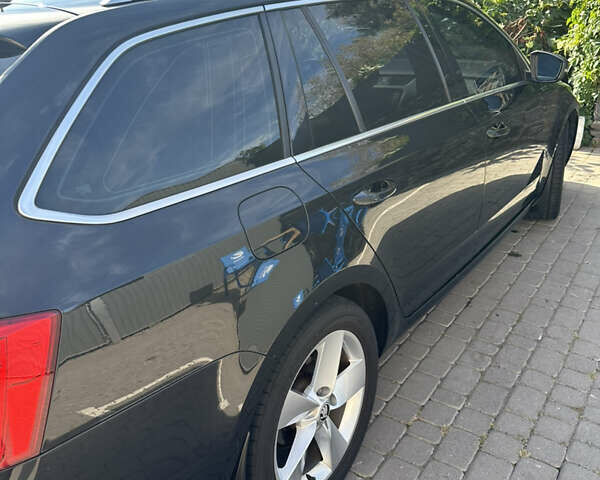 Черный Шкода Октавия, объемом двигателя 2 л и пробегом 263 тыс. км за 12500 $, фото 3 на Automoto.ua