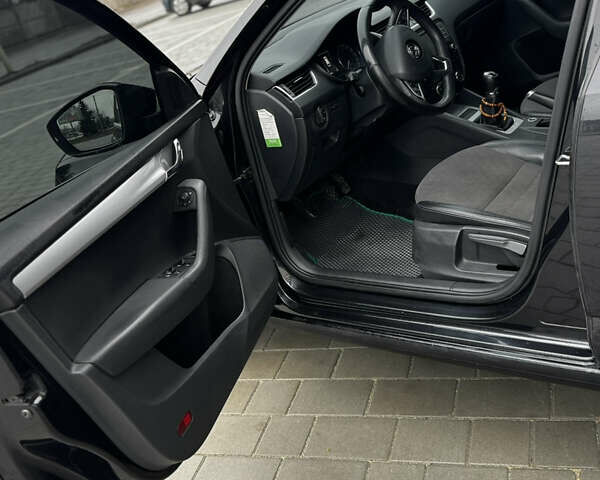 Чорний Шкода Октавія, об'ємом двигуна 1.6 л та пробігом 149 тис. км за 10999 $, фото 11 на Automoto.ua