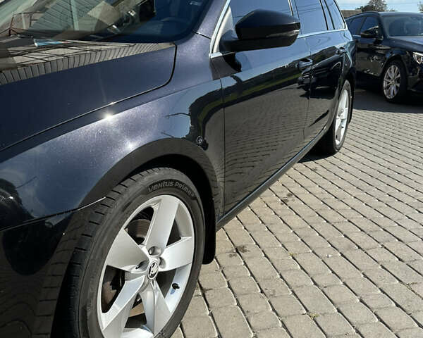 Черный Шкода Октавия, объемом двигателя 2 л и пробегом 263 тыс. км за 12500 $, фото 2 на Automoto.ua