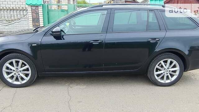 Черный Шкода Октавия, объемом двигателя 2 л и пробегом 232 тыс. км за 13000 $, фото 4 на Automoto.ua