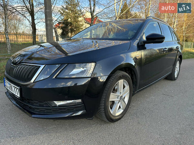 Черный Шкода Октавия, объемом двигателя 2 л и пробегом 266 тыс. км за 14450 $, фото 1 на Automoto.ua
