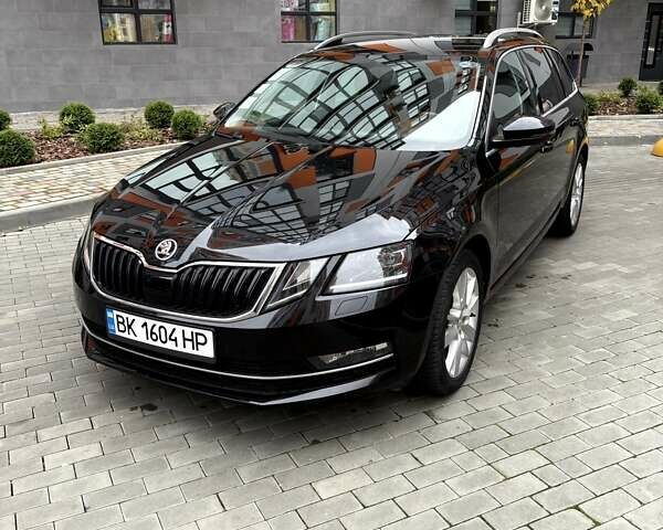 Чорний Шкода Октавія, об'ємом двигуна 1.6 л та пробігом 212 тис. км за 14200 $, фото 7 на Automoto.ua