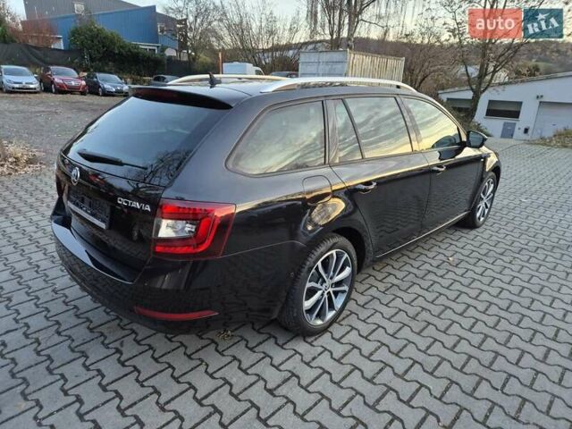Черный Шкода Октавия, объемом двигателя 2 л и пробегом 235 тыс. км за 15400 $, фото 2 на Automoto.ua