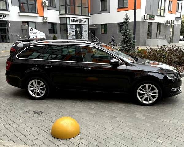 Чорний Шкода Октавія, об'ємом двигуна 1.6 л та пробігом 212 тис. км за 14200 $, фото 1 на Automoto.ua