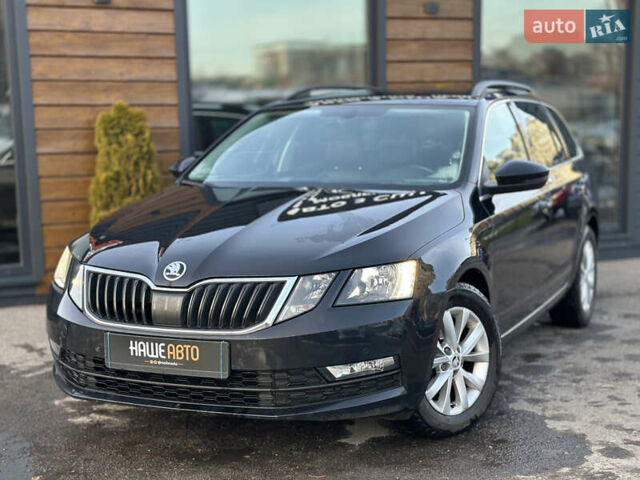 Чорний Шкода Октавія, об'ємом двигуна 1.6 л та пробігом 259 тис. км за 14200 $, фото 1 на Automoto.ua