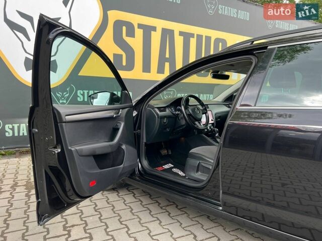 Чорний Шкода Октавія, об'ємом двигуна 2 л та пробігом 244 тис. км за 15300 $, фото 11 на Automoto.ua