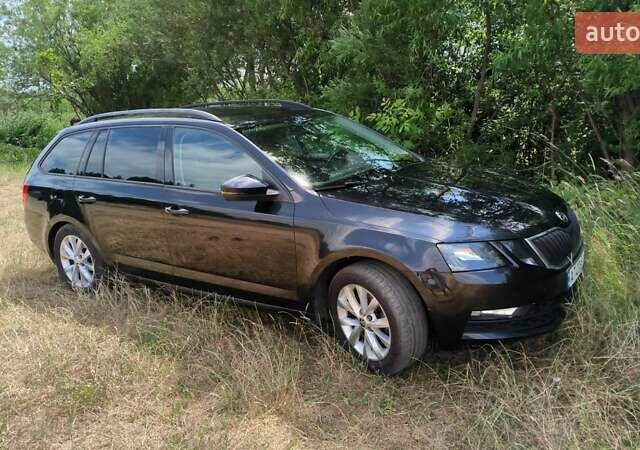 Чорний Шкода Октавія, об'ємом двигуна 1 л та пробігом 339 тис. км за 11999 $, фото 2 на Automoto.ua
