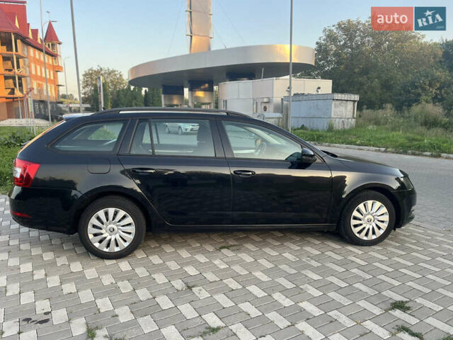 Черный Шкода Октавия, объемом двигателя 1.6 л и пробегом 231 тыс. км за 13000 $, фото 1 на Automoto.ua