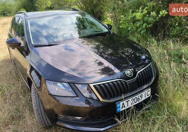 Чорний Шкода Октавія, об'ємом двигуна 1 л та пробігом 339 тис. км за 11999 $, фото 3 на Automoto.ua