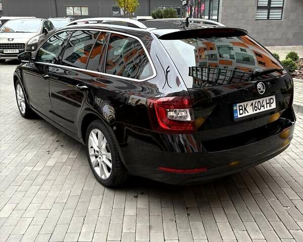 Чорний Шкода Октавія, об'ємом двигуна 1.6 л та пробігом 212 тис. км за 14200 $, фото 9 на Automoto.ua