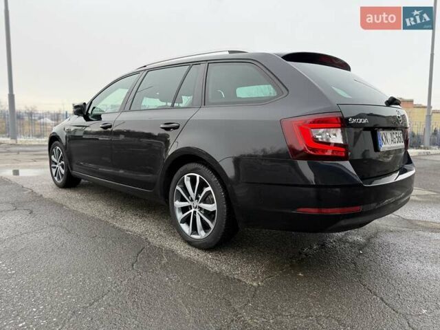 Черный Шкода Октавия, объемом двигателя 2 л и пробегом 235 тыс. км за 15800 $, фото 5 на Automoto.ua