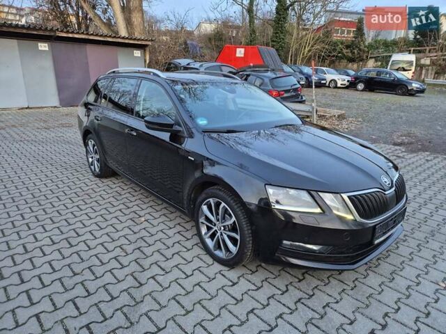 Черный Шкода Октавия, объемом двигателя 2 л и пробегом 235 тыс. км за 15400 $, фото 1 на Automoto.ua