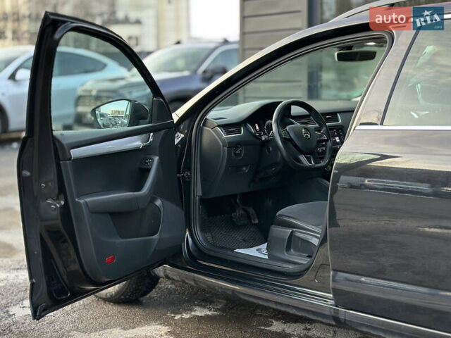 Чорний Шкода Октавія, об'ємом двигуна 1.6 л та пробігом 259 тис. км за 14200 $, фото 23 на Automoto.ua