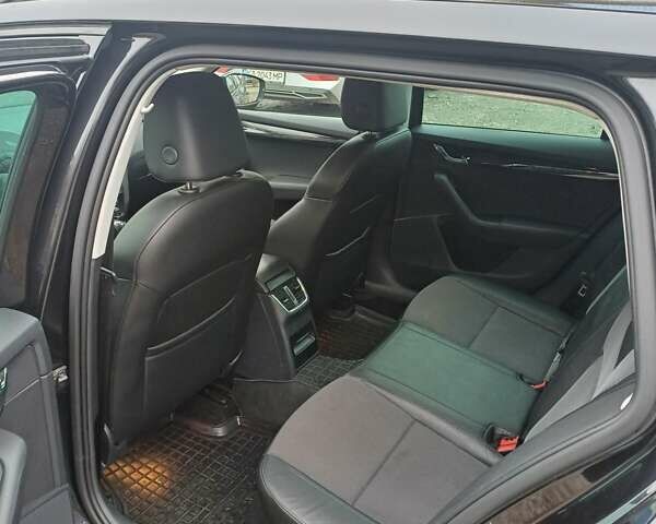 Черный Шкода Октавия, объемом двигателя 1.6 л и пробегом 270 тыс. км за 14000 $, фото 17 на Automoto.ua