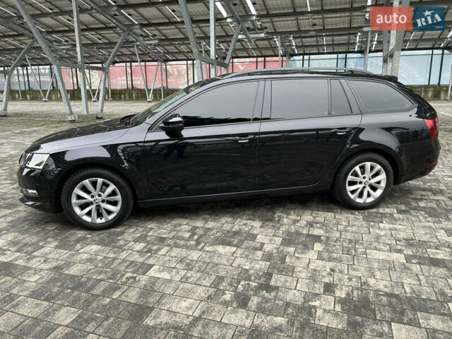 Черный Шкода Октавия, объемом двигателя 1.6 л и пробегом 219 тыс. км за 13500 $, фото 1 на Automoto.ua