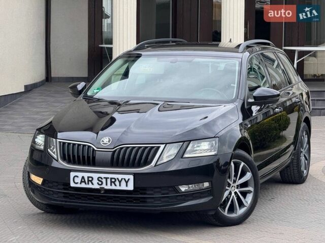 Чорний Шкода Октавія, об'ємом двигуна 2 л та пробігом 244 тис. км за 16500 $, фото 5 на Automoto.ua