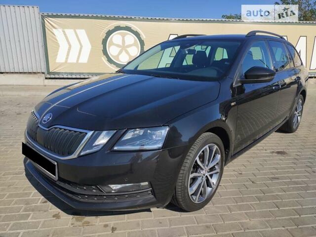 Черный Шкода Октавия, объемом двигателя 2 л и пробегом 249 тыс. км за 15900 $, фото 2 на Automoto.ua