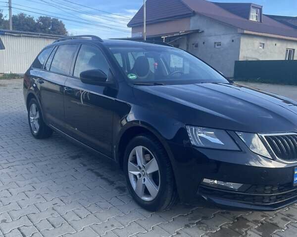 Черный Шкода Октавия, объемом двигателя 2.01 л и пробегом 225 тыс. км за 15000 $, фото 2 на Automoto.ua