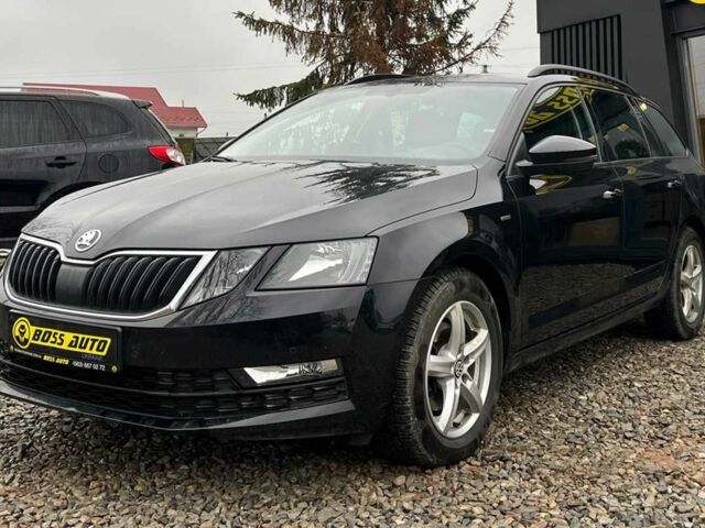 Черный Шкода Октавия, объемом двигателя 2 л и пробегом 204 тыс. км за 18700 $, фото 2 на Automoto.ua