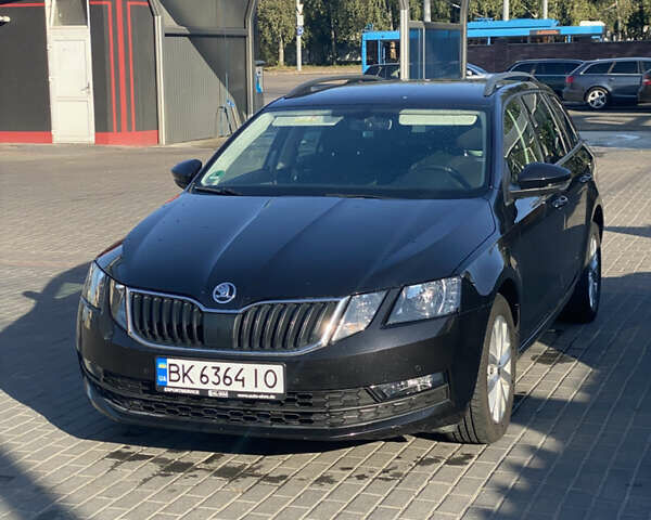 Чорний Шкода Октавія, об'ємом двигуна 1.6 л та пробігом 253 тис. км за 11800 $, фото 1 на Automoto.ua