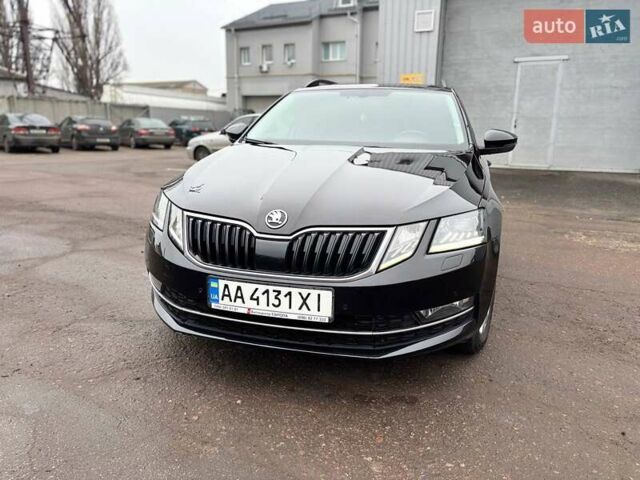 Черный Шкода Октавия, объемом двигателя 1.8 л и пробегом 225 тыс. км за 16000 $, фото 1 на Automoto.ua
