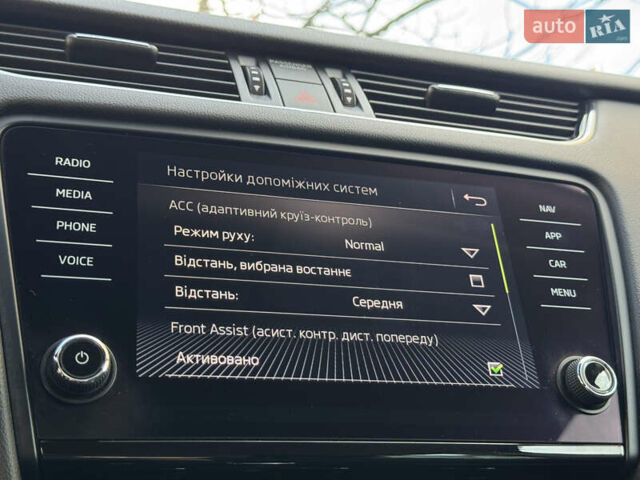 Чорний Шкода Октавія, об'ємом двигуна 2 л та пробігом 218 тис. км за 15299 $, фото 115 на Automoto.ua