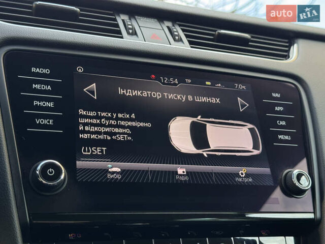 Чорний Шкода Октавія, об'ємом двигуна 2 л та пробігом 218 тис. км за 15299 $, фото 114 на Automoto.ua